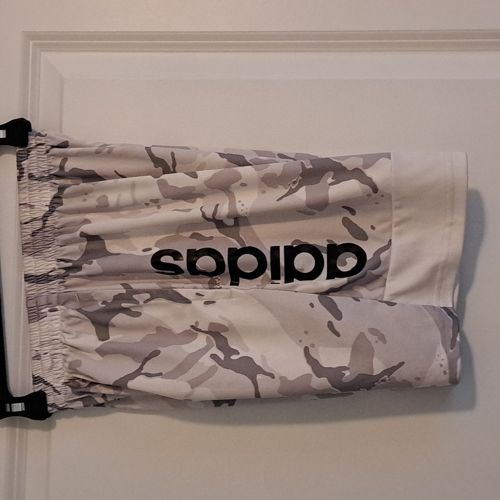 White and gray camouflage adidas shorts